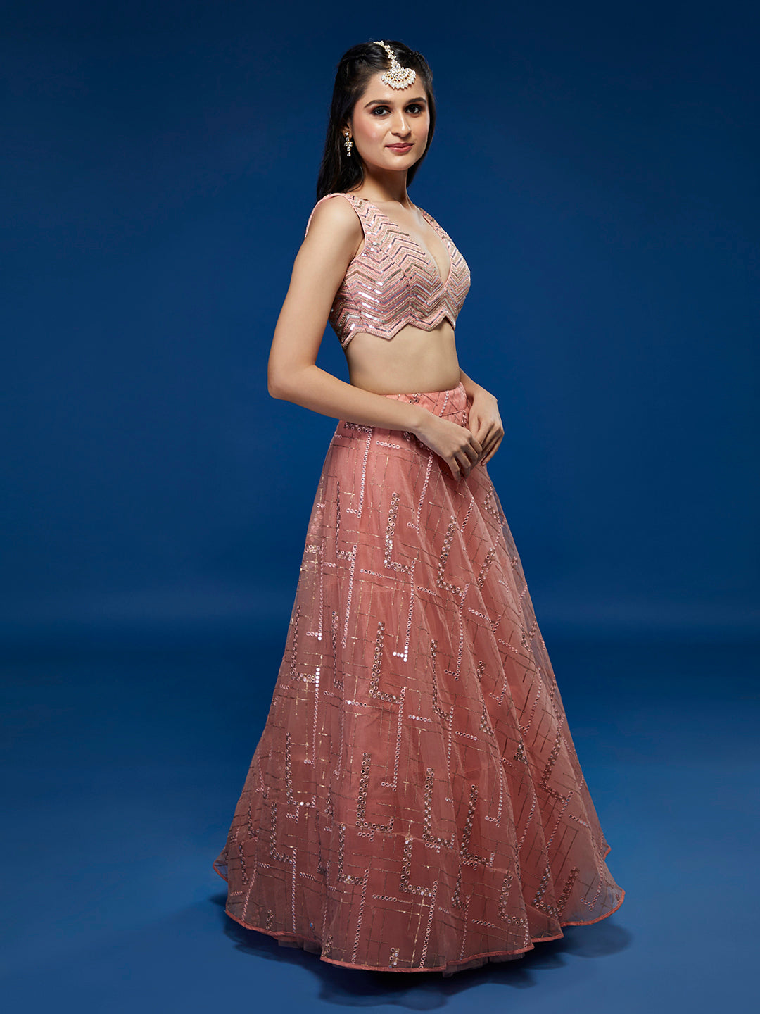 Peach Net Sequins Embroidered Semi-Stitched Lehenga