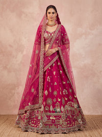 Rani-Pink Silk Ethnic Motif Handwork Golden Sequins-Thread Work Bridal Semi-Stitched Lehenga Choli