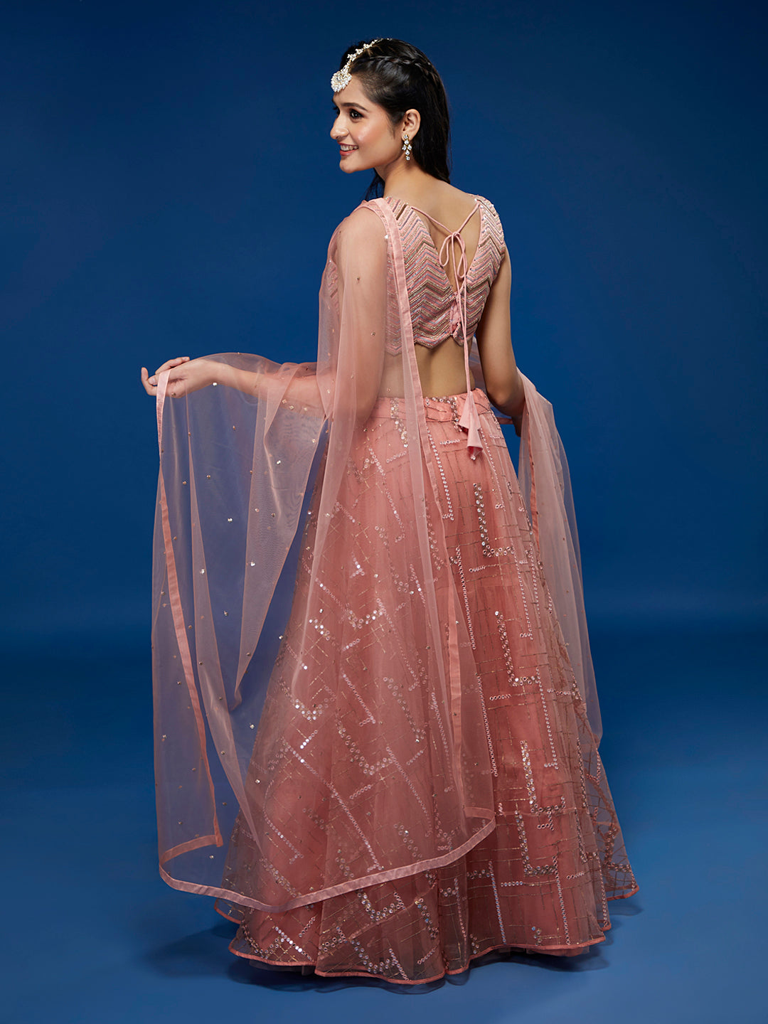 Peach Net Sequins Embroidered Semi-Stitched Lehenga