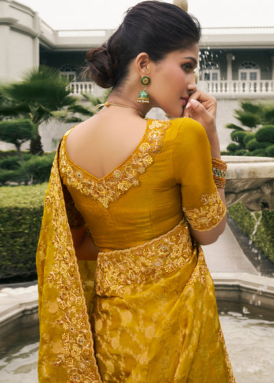 Mustard Color Tissue Silk Embroidered with Golden Stone Floral Heavy Border Saree