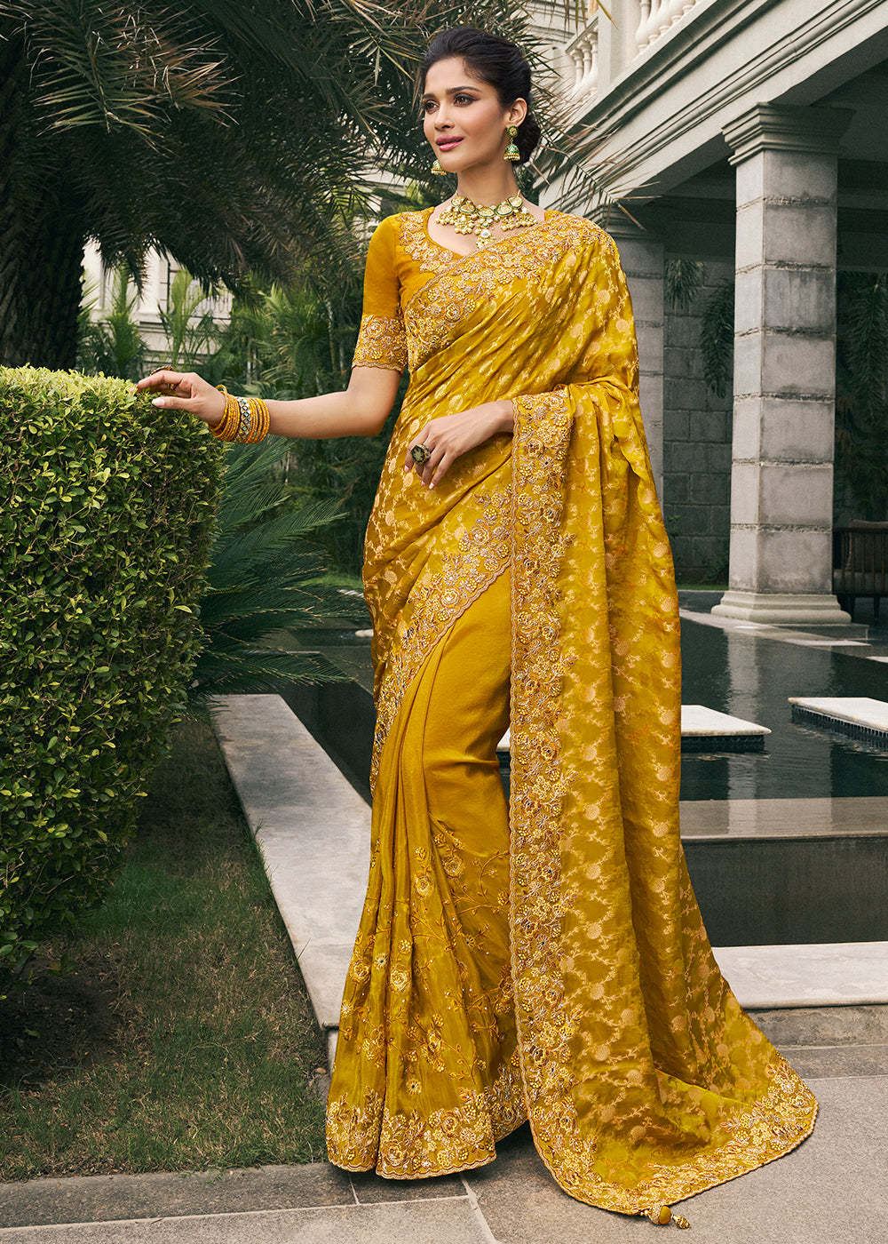 Mustard Color Tissue Silk Embroidered with Golden Stone Floral Heavy Border Saree