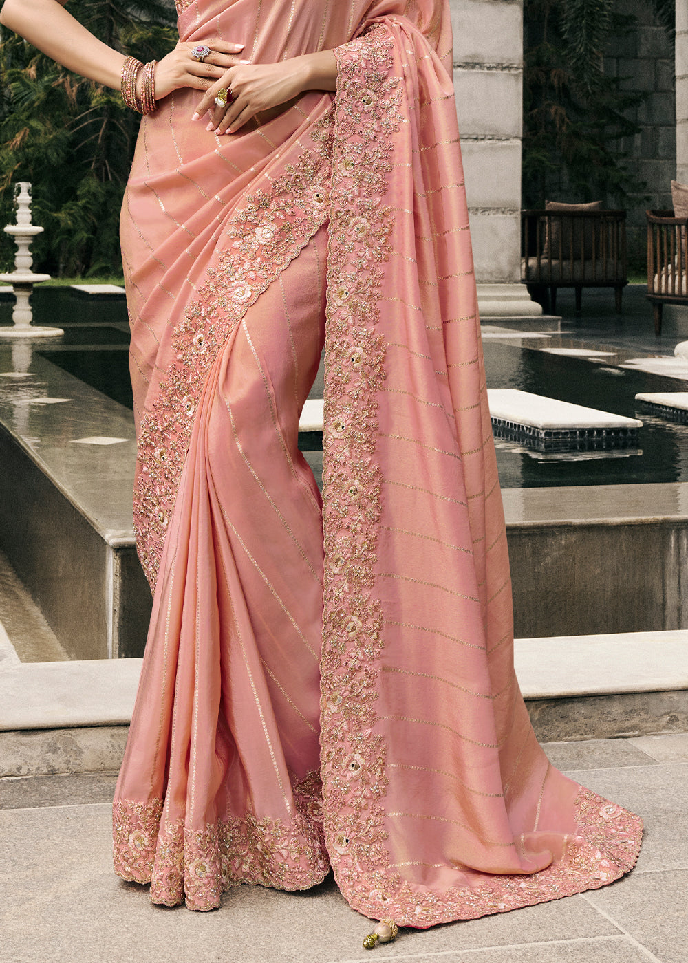 Dusty Peach Color Tissue Silk Embroidered Woven Golden Leheriya Print with Floral Heavy Border Saree with Contrast Blouse