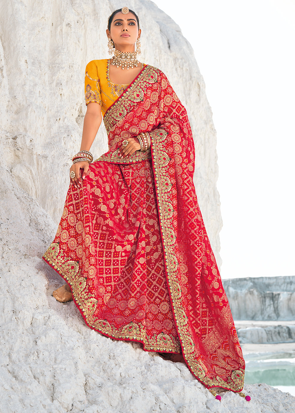 Red Color Pure Georgette Bandhani Patola Print Zari Woven Heavy Saree with Contrast Blouse