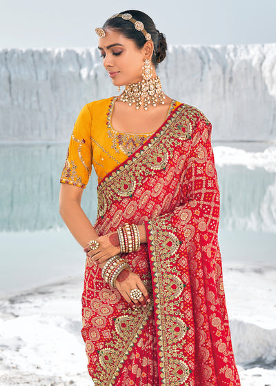 Red Color Pure Georgette Bandhani Patola Print Zari Woven Heavy Saree with Contrast Blouse