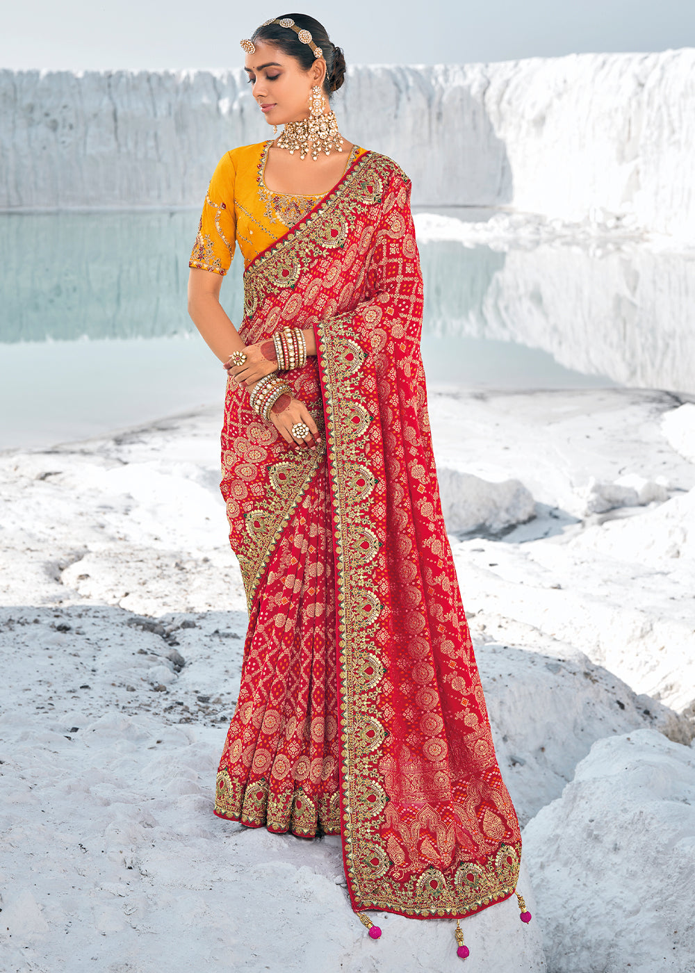 Red Color Pure Georgette Bandhani Patola Print Zari Woven Heavy Saree with Contrast Blouse