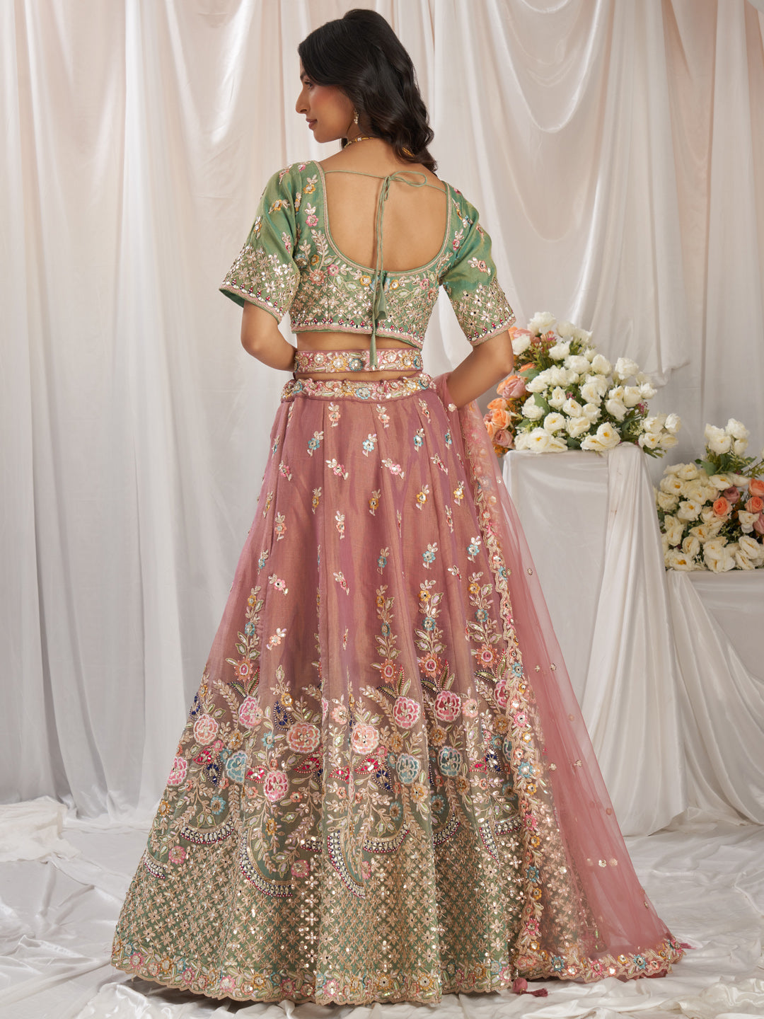 Rosegold-Seagreen Color Bridal Net Embroidered Gotta Patti Work Using Golden Sequins,Mirror and Multi-Thread Semi-Stitched Lehenga