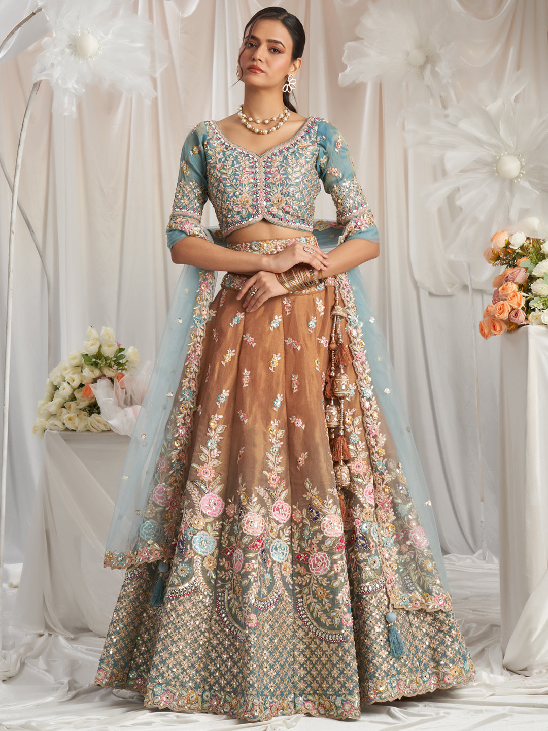 Brown-Turquoise Blue Color Bridal Net Embroidered Gotta Patti Work Using Golden Sequins,Mirror and Multi-Thread Semi-Stitched Lehenga