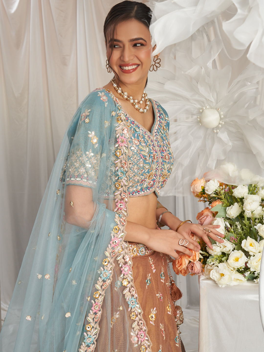 Brown-Turquoise Blue Color Bridal Net Embroidered Gotta Patti Work Using Golden Sequins,Mirror and Multi-Thread Semi-Stitched Lehenga