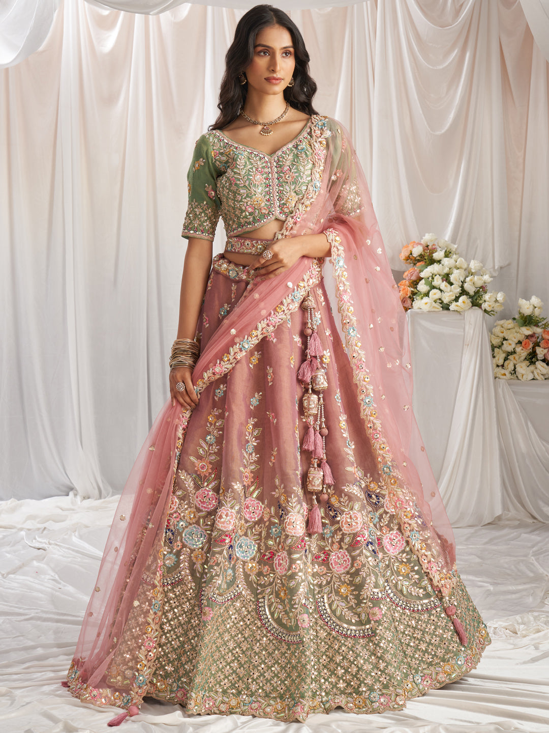 Rosegold-Seagreen Color Bridal Net Embroidered Gotta Patti Work Using Golden Sequins,Mirror and Multi-Thread Semi-Stitched Lehenga