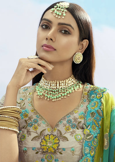 Patch & Cut Work Silk Embroidered Semi Stitched Lehenga Choli & Dupatta